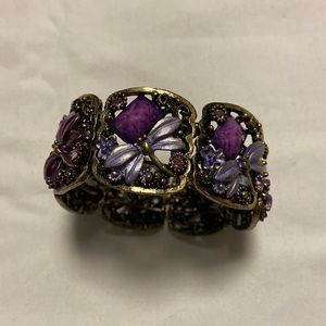 Cuff purple bracelet. The diameter is 2 1/2”.